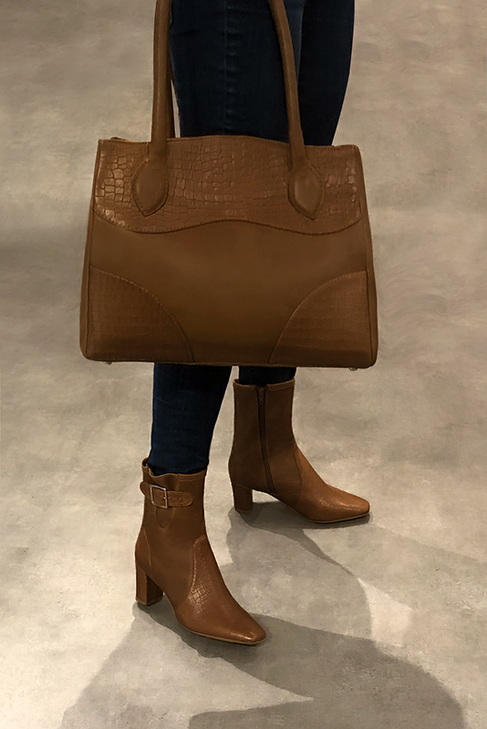 Caramel brown women's ankle boots with buckles on the sides. Square toe. Medium block heels. Worn view - Florence KOOIJMAN